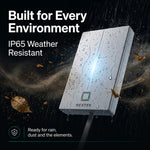 Saurian X62 outdoors in the rain with water droplets on its casing, illustrating its IP65 weather-resistant rating.